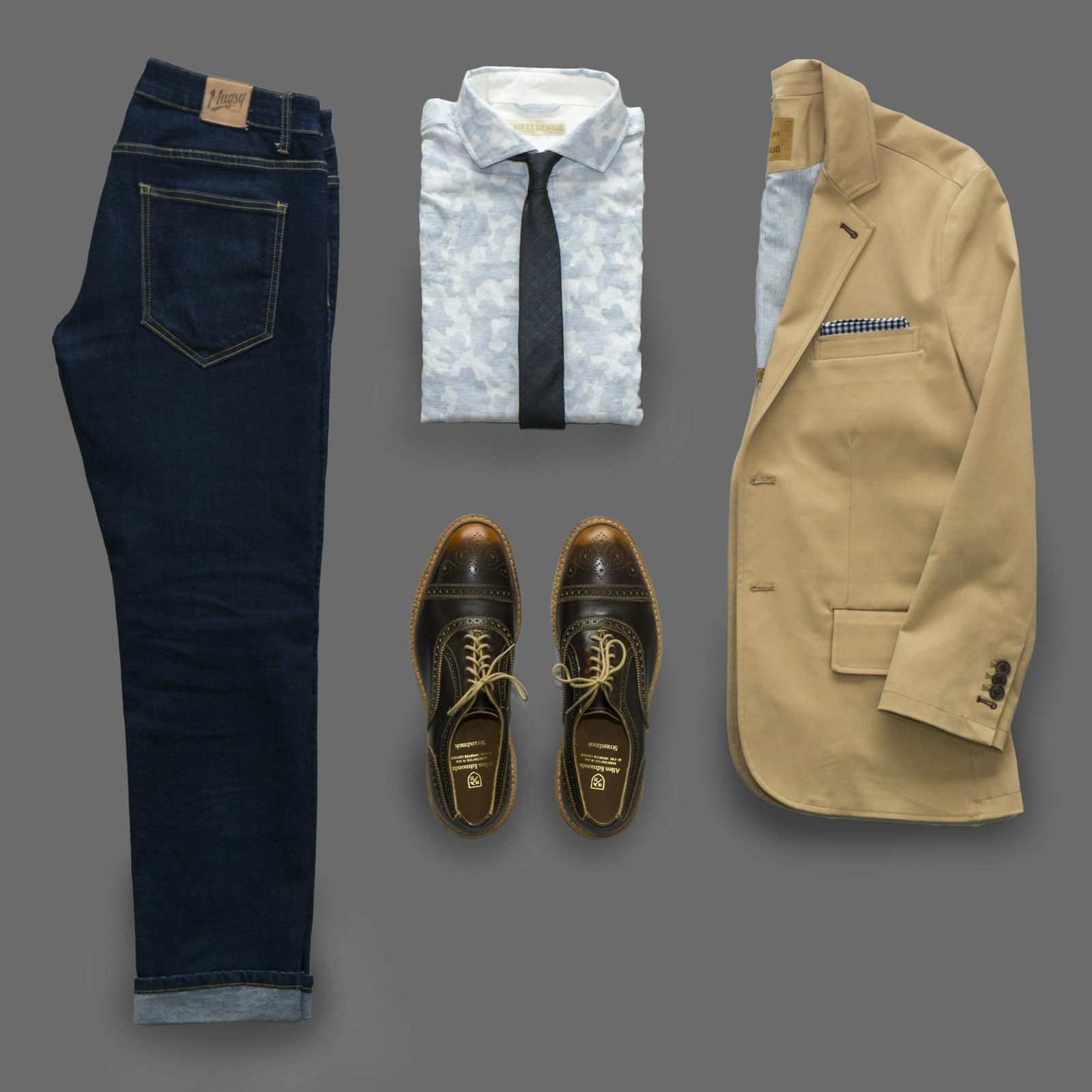 Blue denim jeans paired with brown leather shoes